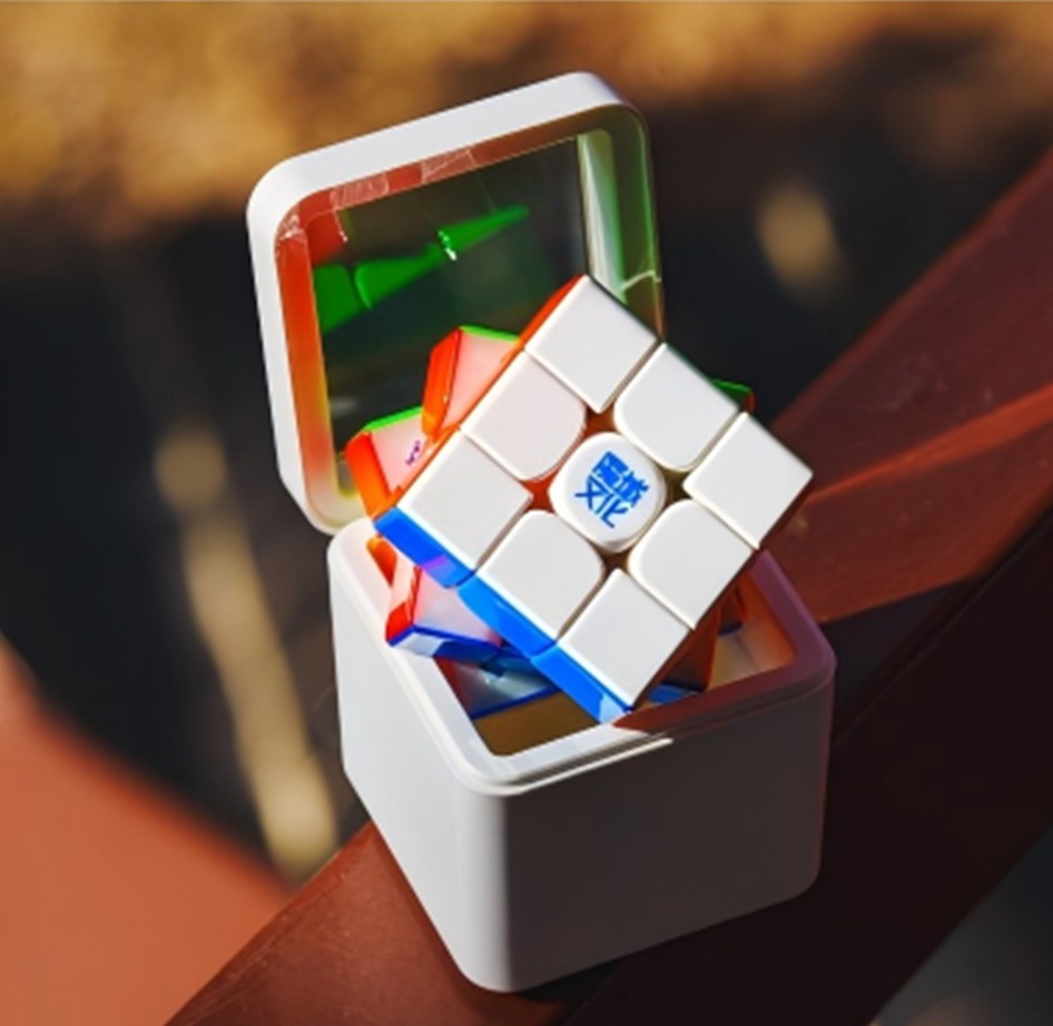 MoYu speed cubes laid out on a bench